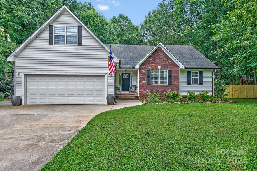 MOTIVATED SELLER! Nestled at the end of a cul-de-sac, this home offers a serene setting with modern updates. This 3-bedroom/3-bath home features recent upgrades, including newer HVAC system, fresh paint & updated flooring. The main level provides spacious living with an open floor plan that connects living room, dining & kitchen. The living room boasts vaulted ceilings & stone fireplace. The kitchen includes stainless appliances & walk-in pantry. The dining area overlooks a fenced backyard with oversized deck, patio, storage building & playhouse, making it ideal for entertaining or relaxation. The primary bedroom offers an attached office area & private patio, along with bathroom featuring a shower & separate garden tub. Upstairs, you’ll find a generous bedroom with a walk-in closet, additional office/flex space & bathroom. The property includes an extended concrete pad for parking & RV hookup. Experience country living within close proximity of interstate & restaurants. No HOA!