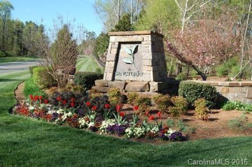 Lovely oversized 5+ acre home site in prime Southwest Charlotte community. Beautiful treed lot. The Sanctuary offers 1300 acres with a 17 acre waterfront Amenity Camp, nature trail, tennis, etc.