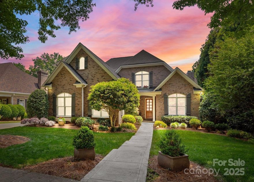 Located in one of Ballantyne's most sought-after neighborhoods, Highgrove, which features a park-like ambiance with picturesque treelined streets. This custom, full-brick home offers a desirable floor plan with the primary suite on the main floor & an open floor plan with the kitchen opening to the great room. Expect to be impressed with gorgeous features including vaulted ceilings, a two-story stone fireplace, plantation shutters, updated modern light fixtures, hardwood flooring, a serene private screened porch, patio with built-in grill, fenced backyard and irrigation. The upstairs has a large bonus room with additional storage space, 3 bedrooms (one with an ensuite bathroom, and additional jack-n-jill bath for the other 2 bedrooms) and large walk-in closets. An additional detached one car garage has an unfinished apartment above (with framing and plumbing complete) to allow for additional living space or storage. Close to top-rated Ardrey Kell High School, shopping and dining!