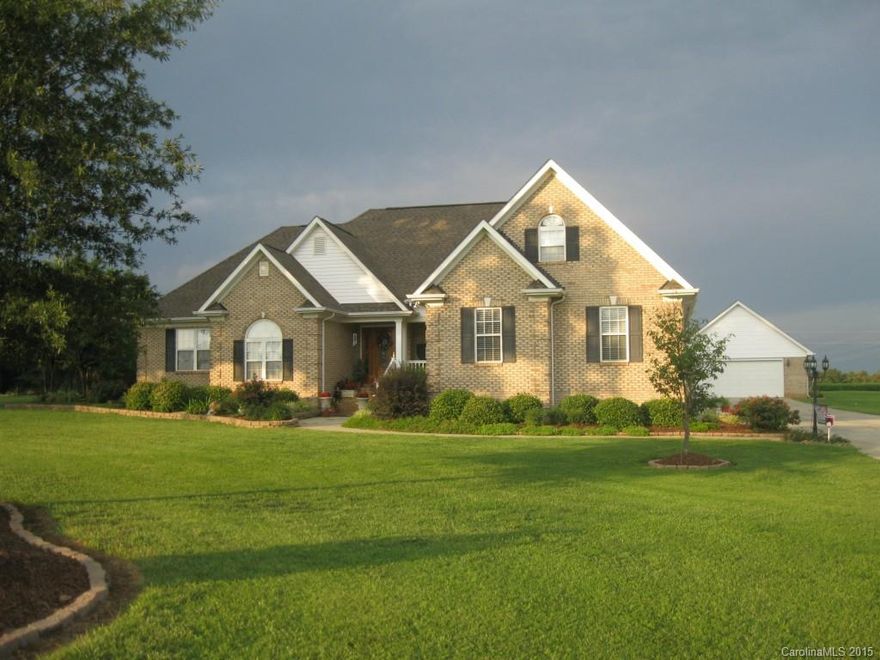 ESCAPE THE HASSLE of CITY LIFE! Custom Built brick ranch w/BONUS over garage nestled on 2.31 acres in UNIONVILLE! Covered front & rear porches. Oversize attached garage plus detached gar/workshop w/rear carport. Cook's kt with corian counters and glass tile backsplash. MBA boats Jacuzzi whirlpool plus 4' shower. Huge UR w/mud sink & Cabinets. Lovely rural setting. Don't miss out on this one!