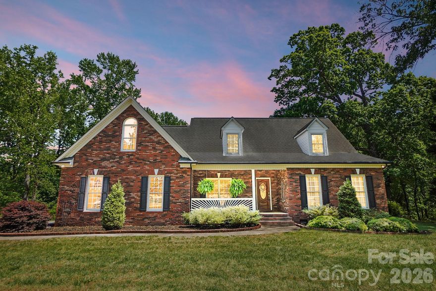 Welcome to 13901 Cabarrus Station in Midland, NC—where comfort, space, and a peaceful setting come together beautifully. This well-maintained brick home sits on a gorgeous lot with spacious front and back yards, perfect for enjoying the outdoors or creating your dream garden.

Inside, you’ll find a warm and inviting family room with a fireplace, a functional kitchen with a breakfast bar, and a dining area ideal for gathering with family and friends. The large primary suite offers a relaxing retreat with its own private bath. The main level also features a convenient half bath, a charming covered front porch, and a large side-entry garage with a utility room perfect for tools and storage.

Upstairs includes two additional bedrooms, a full bath, and a huge bonus room—ideal for a playroom, office, or flex space to fit your needs.

Step outside and unwind on the expansive back deck, perfect for early morning coffee or quiet evenings.

Located in Midland, this home offers easy access to I-485, nearby shopping and dining in Locust, and outdoor recreation at Rob Wallace Park.

If you’re looking for a peaceful setting with room to grow, garden, and enjoy nature—this one is truly special and won’t last long!

Heat Pumps were replaced in 2015 and 2018.