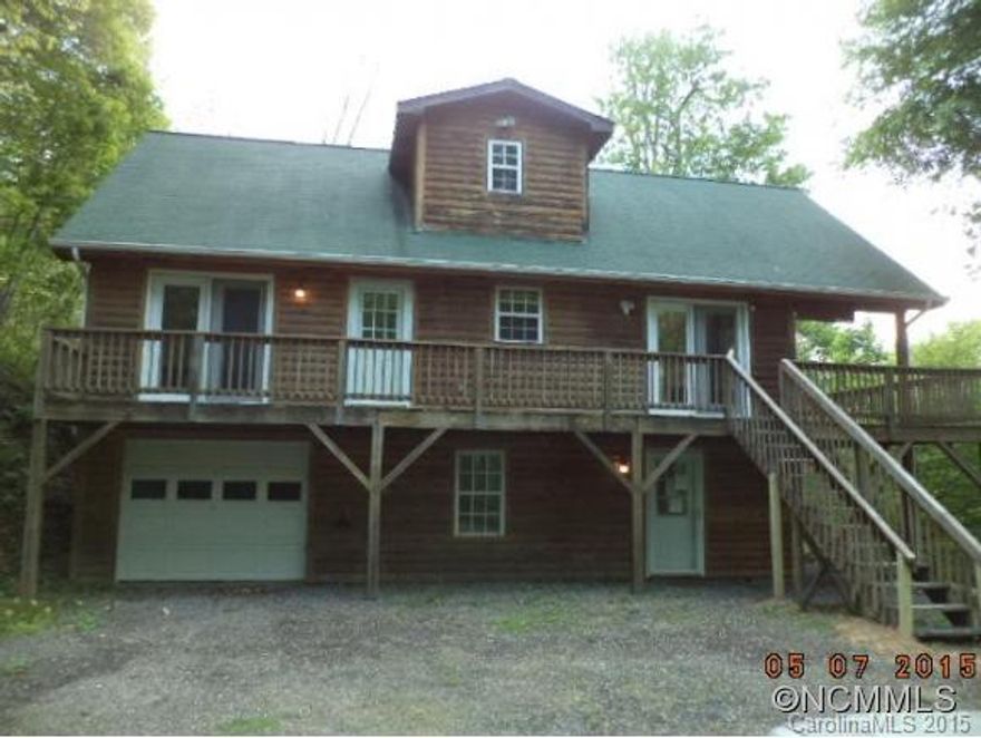 Beautiful log home has a stone fireplace; hardwood floors & a loft. Basement has a finished bonus room. Open and airy throughout. Outdoor stone patio and stone walkway; covered front porch.  HVAC Ventilation system in basement. Home has 2 beds,3 full baths 1400 square ft with wrap around deck. See attachment for PAS requirements and WFHM offer submittal information in MLS document section. No implied or express warranties from agent or seller