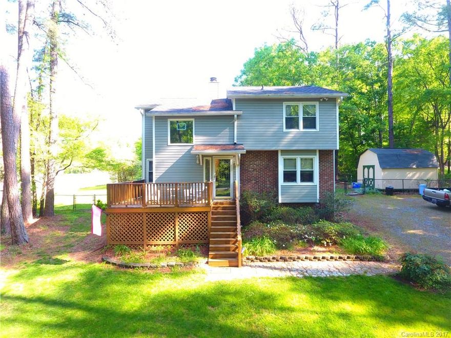 Welcome home to a wonderful established neighborhood with low HOA dues and county taxes!! Step inside to two fireplaces, less than a year old carpet, laminate flooring, tile, and more! Relax on the screened-in porch or spacious front porch and enjoy views of the pergola, fenced-in back yard, and almost a full acre yard!  *Seller providing 1 year home warranty!*
