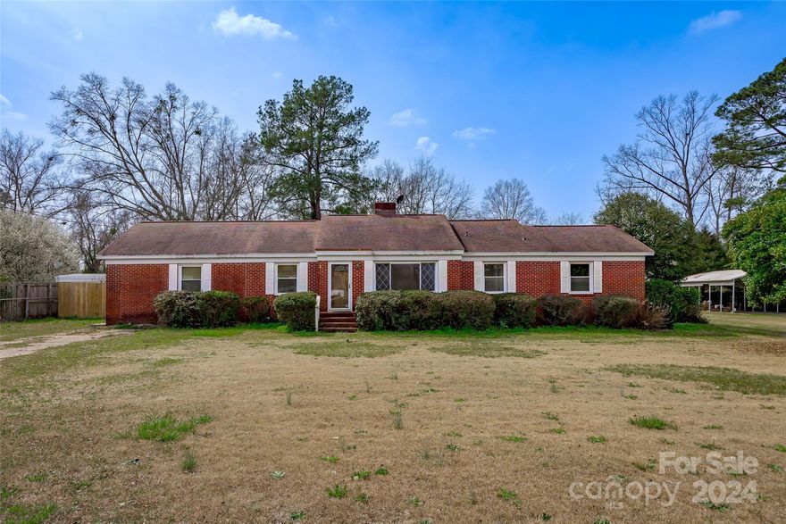 This lovely 3 bedroom, 2 bath brick home conveys warmth & character, boasting a blend of classic features & comforts. The brick exterior lends a sense of durability & solidity. Upon entering, you're welcomed into the living area with a fireplace & hardwood floors that extend throughout most of the home. Large windows bathe the room in natural light, creating a bright & airy atmosphere. The kitchen is thoughtfully designed with ample cabinet space, a gas range, & a pantry with pull out drawers, making meal preparation a delight. The primary bedroom boasts his & hers walk in closets along with 2 extra storage closets. One of the highlights of this home is the sunroom, a tranquil retreat where you can unwind. Outside, a spacious fenced backyard provides a safe & private oasis for outdoor gatherings, gardening, or simply enjoying the fresh air. 
With your loving touch, the home can be your private sanctuary.
Being sold As Is.