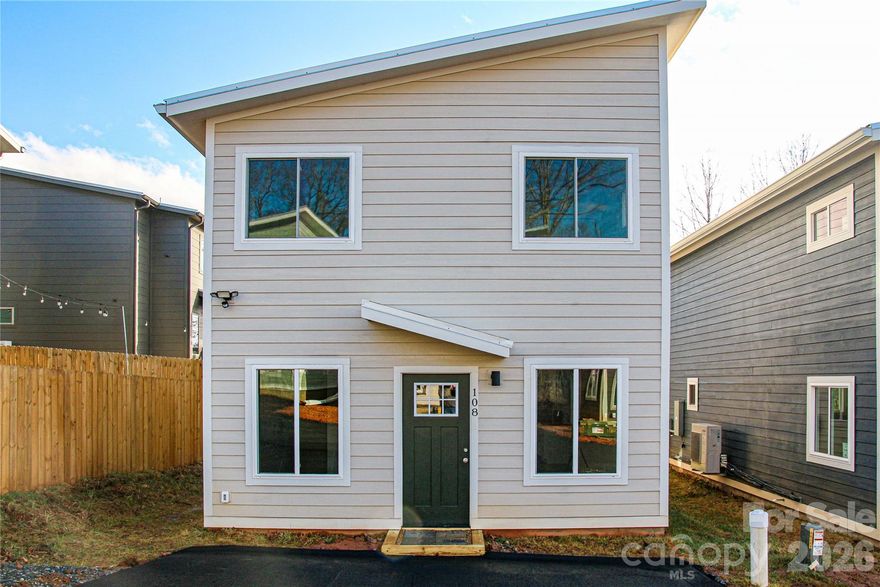 West Asheville Brand New Construction close to Haywood Road, River Arts District and Downtown. Adorable 3BR / 2.5BA with Mountain Views. Bamboo floors and Tile throughout main levels, Tall Ceilings in bedrooms, and Open Wood Beams in Living Room. Great blend of modern fixtures with warm feelings throughout- Wood floors, Tile bathrooms, Tall ceilings in bedrooms. There are almost no new homes for sale in this price point, let alone in desirable West Asheville. Come take a look! Part of a new pocket neighborhood with shared open space for all owners. Built by Compact Cottages. One Year New Home Construction Warranty and Longer warranties on many home components. House construction in final stages. Up to 8 total houses available. Will be paved pocket neighborhood once complete.