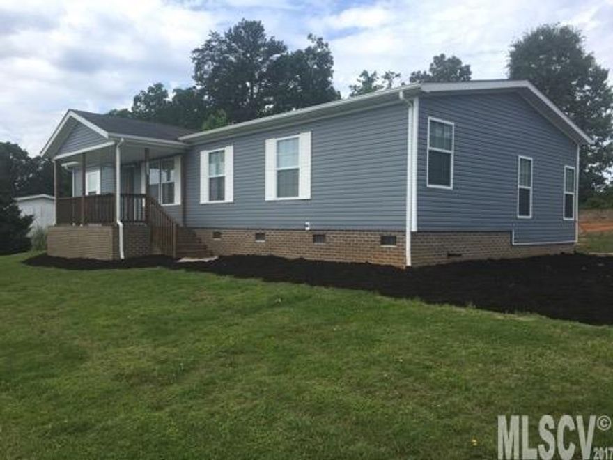 Upscale Manufactured Home App. 1600 Sq. Ft. 3 Bedroom 2 Bath Island Kitchen Den W/ Fireplace Master Bath has His and Hers Vanity Garden Tub Separate Shower Walk in Closet. Brick Underpinned Covered Porch and Rear Deck on .87 Acre Lot. List Price includes Heat Pump Installation.
