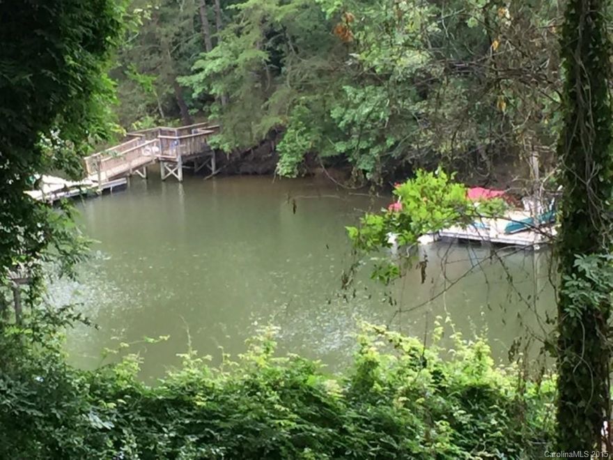 Want to build your dream home on Lake Wylie?  Here's your chance!  This wooded homesite provides the perfect opportunity to wake up in the morning with a view of the water!  The lot right beside this one is also available for purchase.  (Lot 46)  Priced to sell quickly!