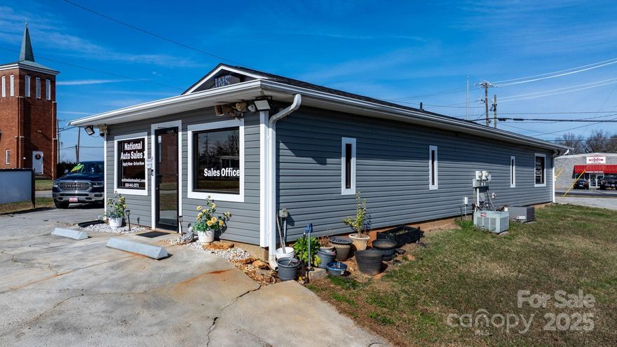 Discover a versatile commercial opportunity in Hickory, NC! Conveniently located just minutes from downtown Hickory with easy access to Hwy 321 and I 40, this property offers excellent visibility, strong traffic exposure, and outstanding connectivity. Currently operating as a car lot, the site is well-suited for a variety of commercial uses.

The building features two separate spaces, each with its own utilities and rest rooms—ideal for an owner-occupant looking to use one side while leasing the other for additional income. One suite includes a kitchenette, adding flexibility and convenience. The property has previously been used as a barbershop/hairstylist and could also be an excellent office location, with ample parking available. Seller recently installed electrical hook-up for electric car charging. 

Buyers are encouraged to contact the City of Hickory to explore other potential permitted uses.
