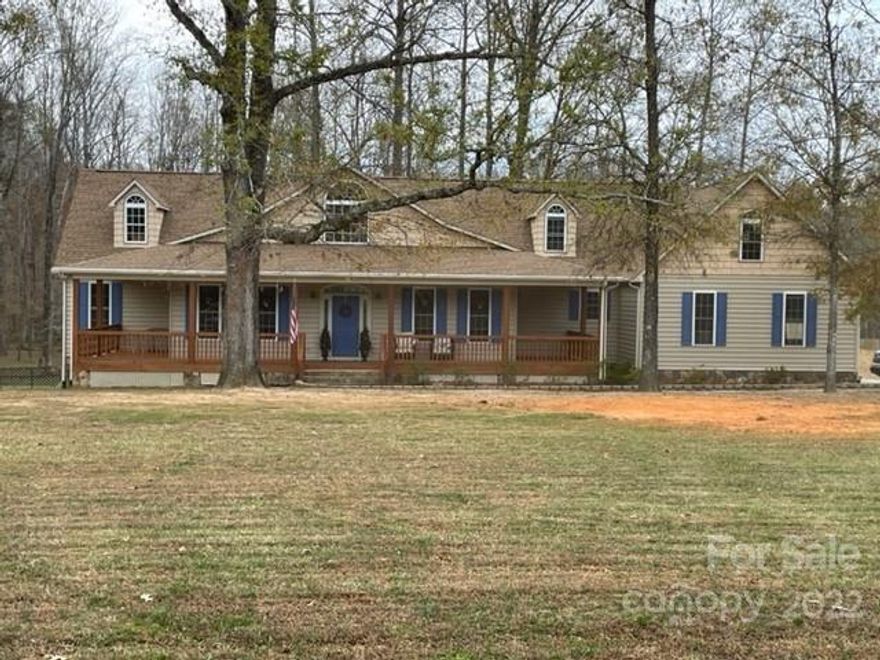 Stunning home with two-sided stone fireplace as the focal point separating the GR and updated kitchen boasting huge island. New LVP (harwood underneath) in common areas, w/ hardwood in bedrooms and bonus rooms and tile in bathrooms and laundry room. The master, with updated owner's bath and walk-in closet has french doors leading to the huge rear screened-in porch. Bedrooms 2 and 3 sharing an updated Jack and Jill full bath with dual vanities, both have large walk-in closets. Bedroom 2 also has french doors leading to the other end of the rear screened porch. Bedroom 4 doubles as a home office, with french doors leading to the front porch. Across from the bedroom/office is a half bath. A dining room, breakfast nook, and laundry round out the main floor. Upstairs hosts 2 large bonus rooms. Plenty of storage w/2 car+ attached garage and shed. An acre of mostly cleared land is fenced in. RV parking w/50 amp service and separate septic.