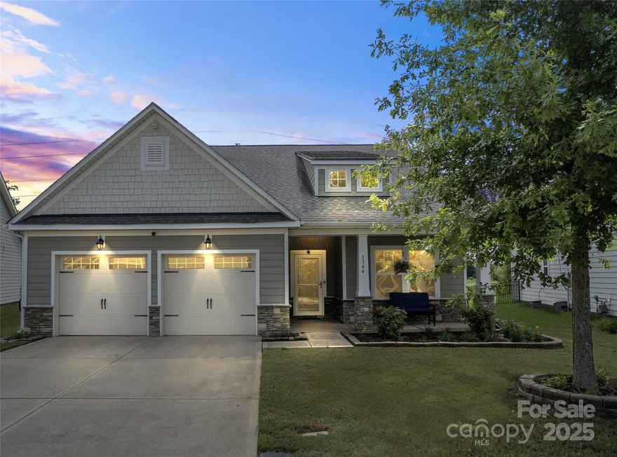 THIS IS A MUST SEE!! Stunning home in a highly desired gated community with a gorgeous kitchen featuring an oversized island, granite countertops and stainless steel appliances with the perfect flow into a large dining room adorned with a wall of built in cabinets. The main level primary ensuite bedroom is full of natural light & features a large walk-in closet. This split bedroom floorplan gives you two additional bedrooms on the main level and a full bath. The newly renovated oak staircase leads you to a fourth bedroom, full bath and a loft on the second level. The loft is generously sized with so many possibilities such as a rec room, media room, library, second living room or office.  You can enjoy sitting on the screened in porch or enteraining guests on the large deck situated out back overlooking the fenced in yard and beautiful landscaping. Enjoy the community features such as a community pool, playground, club house, walking trails and leased boat slips. Features of the home include: Professionally installed home network w/ fiber internet (ask agent for more details), whole home water filtration system, dual zoned HVAC, induction stove, electronic keypad on front door, Ring camera. Come check out 1344 Whistling Ln and you will feel like you're home!  **Some photos virtually staged.**