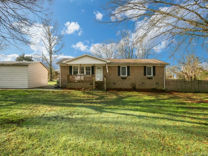 NEW PRICE, GREAT LOCATION,  bring your buyers. Country living at its best.  Minutes from I-77, open floor plan, spacious kitchen, rocking chair front porch, large screen porch, fenced yard. Beautiful hardwood flooring throughout house with tile in bathrooms.  Carport has lights and electrical outlets. Additional storage building.  Close proximity to schools and only York Co. taxes.  Property is eligible for 100% financing.