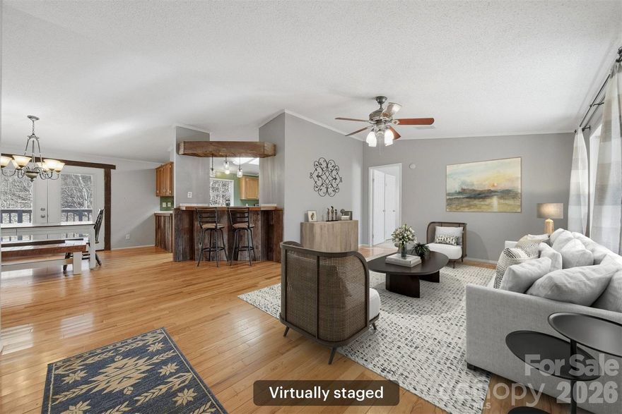 Escape to your own private mountain retreat on +/- 30 secluded acres at the end of a quiet country road. This beautiful 3-bed, 2-bath home welcomes you with a covered front porch, a spacious back deck, and plenty of outdoor living space to take in the peace of the foothills. Inside, the home is bright, inviting, and move-in ready—perfect as a full-time residence or weekend escape. A two-bay detached garage with an upper level provides excellent storage, a workshop area, or future guest space. The property features old logging roads and a bold creek running along one side of the property line. A flat old homeplace offers the ideal setting for a new build site or garden area. With no HOA and no restrictions, you’re free to live, ride, hunt, or simply unwind surrounded by nature. Whether you’re looking for a private homestead, a family compound, or a place to play in the North Carolina mountains, 3066 Hartley Kincaid Road delivers room to roam and a lifestyle that’s hard to find.