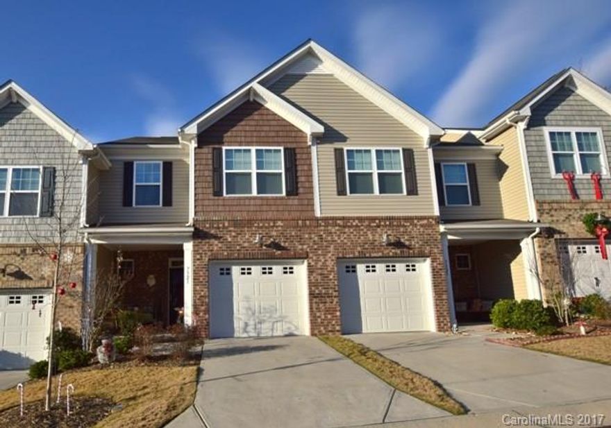 This townhome is cute as can be and in a very desirable neighborhood.  Open floor plan, stainless appliances in the huge kitchen which also has a work island/breakfast bar.  Great room with fireplace/gas logs.  All bedrooms located upstairs along with the laundry room.  Awesome partially covered stone paver patio and single garage.  Hurry - it won't last long.