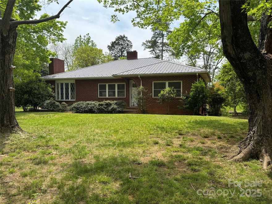 Charming 1949 Gem Near Downtown – 3 Bed, 2 Bath Step into timeless character with this beautifully updated 3-bedroom, 2-bath home, built in 1949 and loaded with charm. Original hardwood floors flow throughout the home, adding warmth and classic appeal. A cozy fireplace anchors the living area—perfect for relaxing evenings. Enjoy cooking in the updated kitchen, complete with all new appliances and plenty of natural light. The home offers convenience and potential, with a full unfinished basement ready for your personal touch—create a game room, extra living space, or workshop. A carport keeps your vehicle protected, and the location is unbeatable: just minutes from downtown, close to local breweries, restaurants, and the annual BBQ festival and live music events. Whether you're looking to entertain or explore, this home is in the heart of it all. Don’t miss your chance to own a piece of history in a vibrant community! Agent is related to seller!