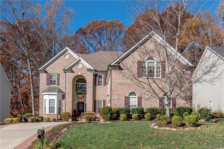Move-in ready open floorplan home w/ custom built-ins, ample storage, mouldings, and hardwoods throughout the main floor. Kitchen features Corian countertops, stainless steel appliances, lg island w/ seating, & recessed lighting. Guest ste on the main floor. Huge master ste upstairs w/ sitting area, luxurious master bath w/ jet tub, dual vanities, & water closet. Backyard is a retreat w/ tree canopy, multi-tier deck, privacy fencing, & fire pit.  Renovated hall bath w/ granite counters & tile.