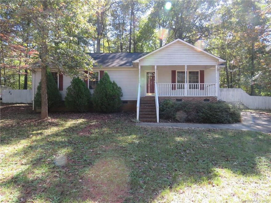 Cute house offers a lovely front porch area with a fenced-in back yard.  Interior is pretty spacious, nice sized kitchen.