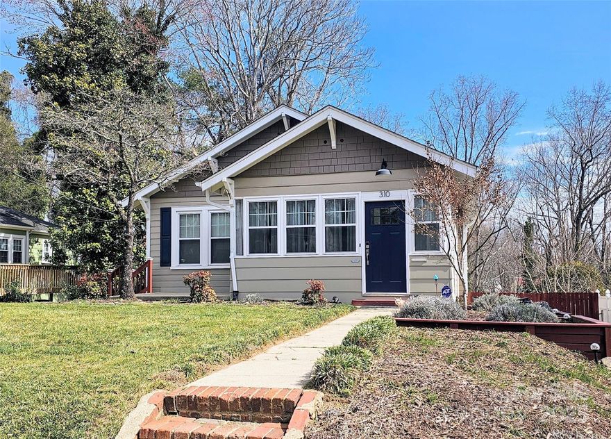 Absolutely charming 1930s bungalow in quiet, established in-town Lenoir neighborhood. Three bedrooms, 1.5 baths, and so much character! Nine foot ceilings, original pine floors, moldings, built-ins and more. Since 2022: Beautiful new kitchen with white shaker soft-close cabinets, granite, new stainless appliances and pantry; all new half bath; renovated hall bath, refinished floors on main level with exception of kitchen snd front BR where new flooring was installed. Laundry on main level. Replacement windows. Attic is partially floored. New double doors to basement storage or workshop area. Fenced back yard with firepit. Only 30 minutes to Blowing Rock and the High Country!