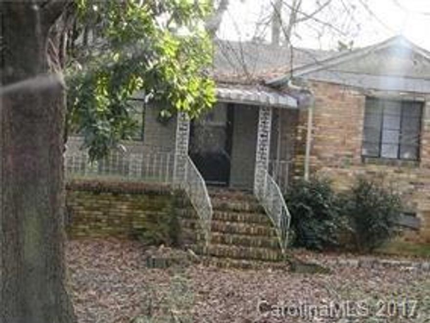Investment property with great potential! Only 5 minutes from downtown Charlotte. Right around the corner from the neighborhood park. Property being sold "as is". This property is boarded up. Entry is NOT ADVISED. ENTER AT YOUR OWN RISK. The listing brokers and seller will assume no responsibility.