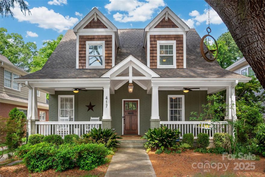 Timeless charm meets modern comfort in this reimagined 1938 bungalow in Charlotte’s historic Elizabeth neighborhood. Renovated in 2015 with a second story and updated systems, it retains original character with repurposed bricks, doors, and attic boards. The sunlit kitchen opens to main living spaces, perfect for daily living and entertaining. Upstairs features spacious bedrooms, a loft, and a spa-like primary suite with soaking tub and cave-style shower. Enjoy a wide front porch, covered back patio with gas fireplace and TV hookup, and a beautifully landscaped yard with firepit. Walk to dining, shops, and the Gold Line streetcar!