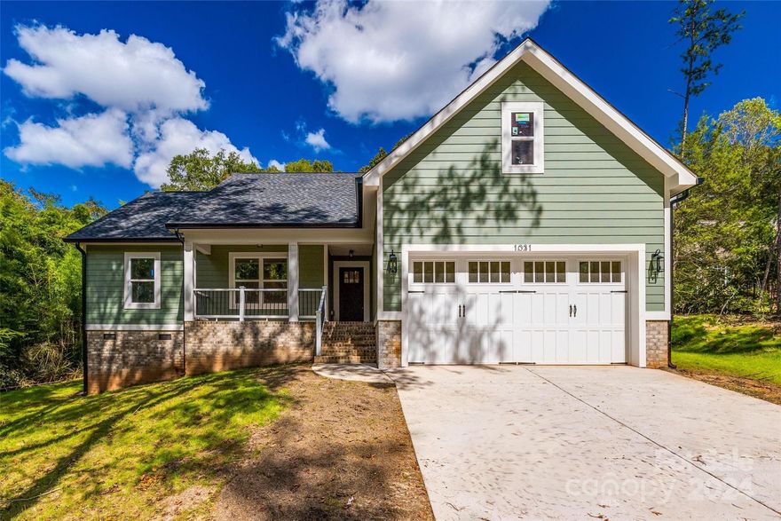 Get custom-built new construction in a peaceful area with no HOA! This home offers a country-like atmosphere close to grocery stores and restaurants. It features Hardie Board siding, which is rot, insect, fire, and storm resistant, and beautiful too! The kitchen showcases quartz countertops, a walk-in pantry, stainless steel appliances, and a large island. The master suite boasts a beautifully tiled shower, a stand-alone tub, dual vanities, a walk-in closet, and gorgeous tile flooring. Extra perks include a two-car garage, a walk-in crawl space, upgraded water pressure, a whole-house sediment water filter, an underground French Drain for rainwater, and a “smart” garage door that opens and closes from anywhere using the phone app. Plus, solar is available in the area.