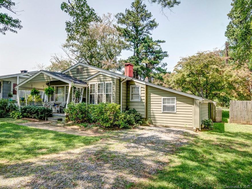 Adorable house with lots of curb appeal and in town location, location, location!  Walk to downtown and the farmers market and enjoy a low maintenance level yard.  The master bedroom is very spacious.  Finished garage is used as a third bedroom.  Needs kitchen and bath updates.