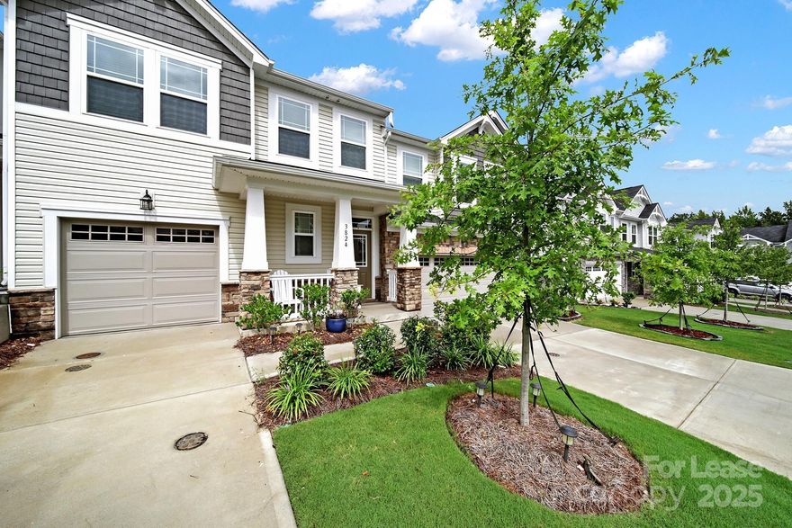 Welcome home to this lovely three bed three and half bath townhome in Indian Land. On the first level you'll find a primary bedroom with an ensuite bathroom and spacious closet, a spacious kitchen with an island that opens to the living room, a one car garage, a guest powder room, and more! The second level features a second primary bedroom with an en-suite bathroom, third bedroom, and another full bathroom. Located in close proximity to Ballantyne, there are endless shopping, dining, and entertainment options nearby!