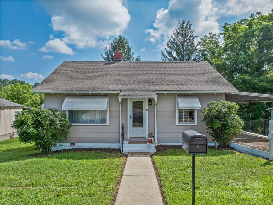 Charming and meticulously maintained, this 1940s home has had only two owners and retains its original character with thoughtful updates throughout. Gleaming refinished floors, restored cabinets, walls, and original door hardware showcase its vintage charm. The updated kitchen features granite counters, newer appliances, and a custom dining table with a matching granite top that conveys with an acceptable offer. The bathroom blends modern updates with a classic clawfoot tub. Major system upgrades include a 2018 heat pump with gas backup, tankless water heater, and reblown attic insulation. The unfinished basement is heated and the outdoor shed offers additional storage. In addition, the back yard is fully fenced. A true move-in-ready gem—perfect as a starter home or turn-key investment!