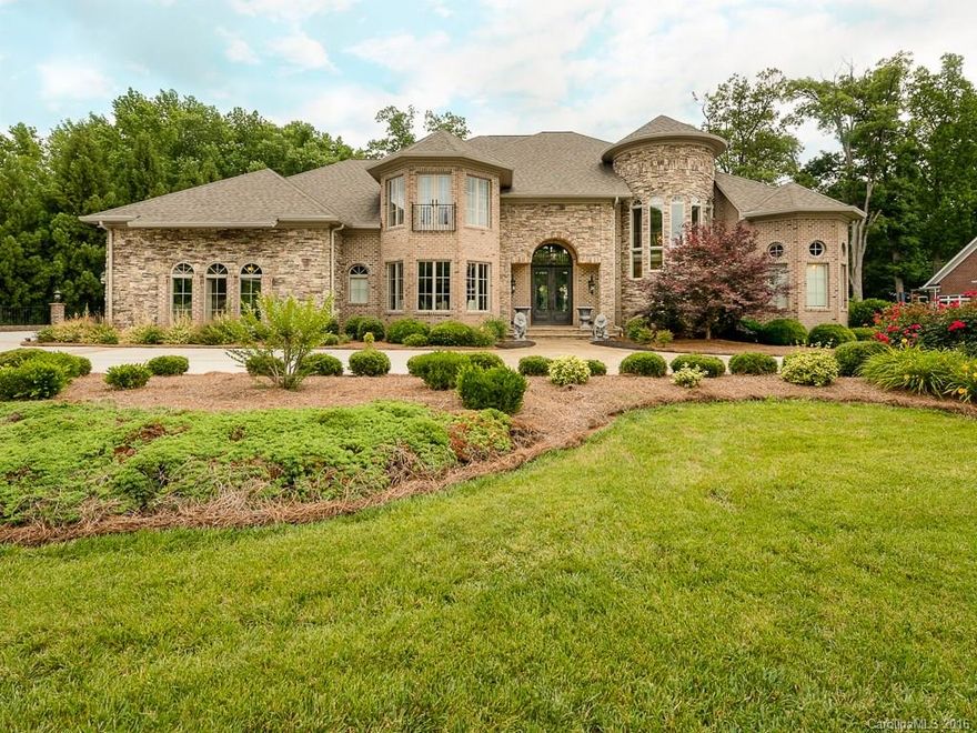 Home on 13th fairway of Gaston Country Club golf course! Chef kitchen w/Subzero & Wolf appliances w/butlers pantry! Formal dining room w/Alabaster light fixture! 4 bedrooms w/french door to covered lanai w/view of golf course! Hardwood, marble, onyx and acid wash concrete floors! Home has 4 car garage on mail level w/1 on lower level! Total of 5 fireplaces! Elevator shaft w/pre wire for elevator! Entire home is music/audio wired, alarm system, and pre-wired for hot tub! Has icynene insulation!