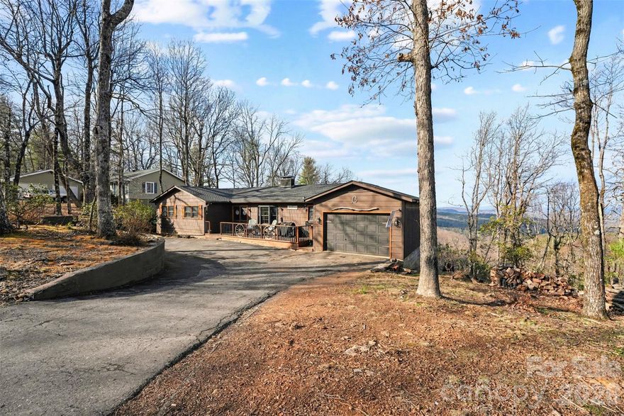 Motivated sellers! Live next door to South Mountains State Park where your backyard is 40+ miles of trails and waterfalls. Located in Pine Mountain, you're approximately 50 minutes from Charlotte, 25 minutes from Hickory, under 45 minutes to Lake Norman, and about an hour to Asheville. Quick access to I-40 makes commuting or weekend trips simple. USDA loan eligible, offering a zero down financing opportunity for qualified buyers. The home is set on over an acre with a roof from 2025 and HVAC from 2019. The main level features three bedrooms and two bathrooms, an open layout designed to draw your eyes straight to the scenery, and a wood-burning fireplace that makes cool evenings feel extra inviting. The expanded kitchen offers plenty of space for gathering and entertaining.Downstairs, the basement includes a private fourth bedroom and two full bathrooms, along with patio access and a dedicated workshop. Mountain privacy. Outdoor adventure next door. Easy access to the city when you need it.
Come see it in person because the view is even better when you're standing in it.
Please do not walk the property without an appointment or an agent.