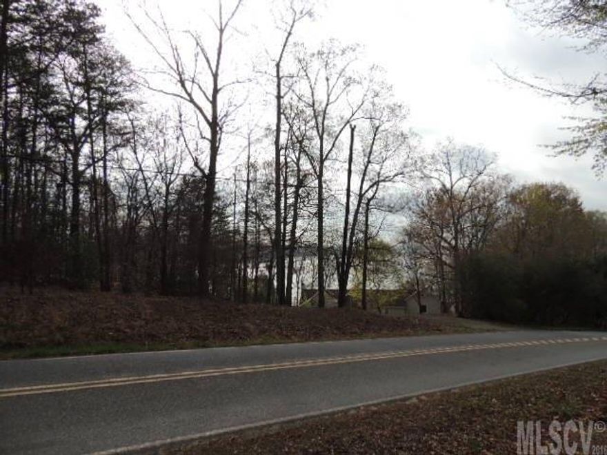 Nice building lot with Lake Norman water views. Gentile sloping, wooded lot. There is a community lake access area with boat ramp within a half mile of lot. Located on state maintained road.