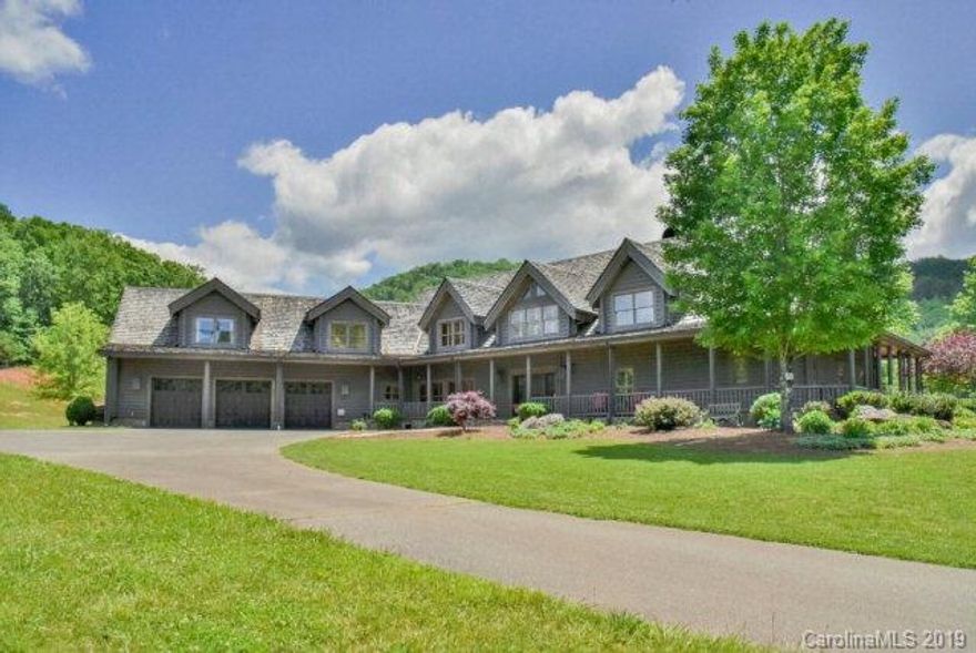 Welcome to paradise in WNC.  this 5000 sq ft custom built home has luxury finishes and large open spaces.  It's located on approx 257 acres w/ a 10 acre pond, additional 2000 sqft log home, small guest cabin, & hunting hut.  The property has multiple barns, pastures, trails, and creeks.  If you're looking for a private estate or hunting camp this is the perfect place!  Enjoy entertaining your guests in the luxury home, fishing/swimming in the pond, ATV riding or hiking on the many trails. 4 parcels see attached!