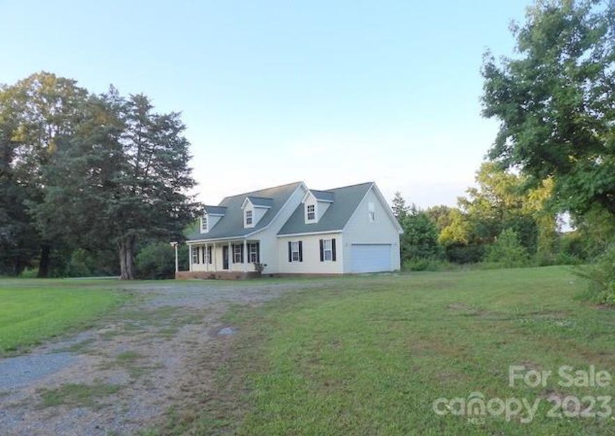 Country living with city convenience!  Enjoy the rocking chair front porch overlooking the large front yard with circular drive.  Beautiful well appointed interior that's move in ready.  New carpet throughout and freshly painted.  The cook's kitchen has loads of counter space, cabinets and black appliances.  The four bedrooms are roomy with lots of closet space.  Upstairs is an office and a bonus room.  The attached 2 car garage is over sized for storage and 2 car parking.  Make your appointment today!