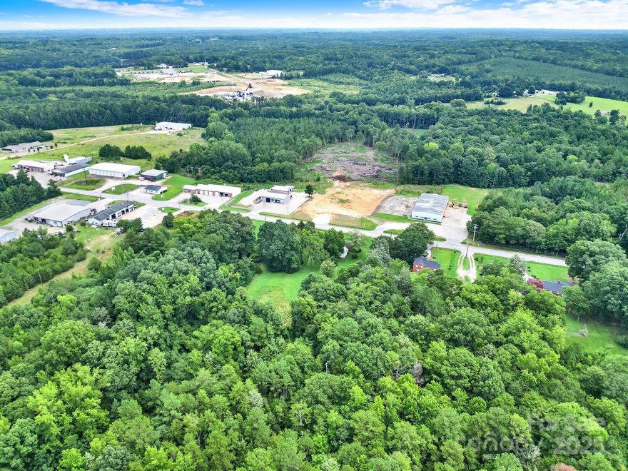 Unique opportunity to own a 3-bedroom, 2-bath home situated on 6.16 acres of land with commercial/business zoning. This versatile property offers endless possibilities — live where you work, develop for business use, or hold as an investment. The home features spacious living areas, a large kitchen, and beautiful acreage offering privacy and expansion potential. Conveniently located with excellent visibility and easy access to major highways and local amenities. Ideal for entrepreneurs, investors, or those seeking a property with both residential and commercial flexibility. HOME IS BEING SOLD AS IS AND WHERE IS