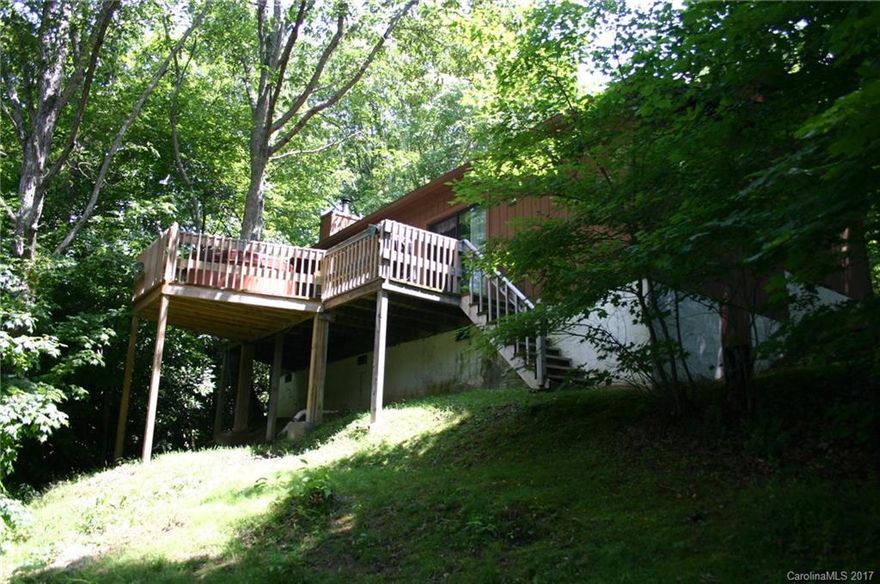 Cute house on .75 acres of land just off Fie Top Road. Follow Split Road to  250 house next to the last one on road.  House is split level with one bedroom and one bath on each level . This home is close to Maggie Valley, Waynesville , Ski Slope the Parkway and only 30 miles from Biltmore House and Asheville . Check this one out today. Great Rental history on the Vacation Rental Addendum