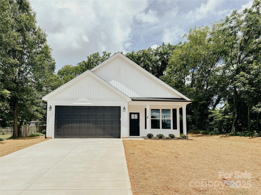 New construction within walking distance of downtown Conover. Open floor plan with vaulted ceilings. The kitchen boasts a central island, granite countertops, a stylish subway tile backsplash, and classic white cabinetry. Attached two car garage. Large laundry closet and pantry. This BRAND NEW three bed, two bath house is ready for you to make it a home.