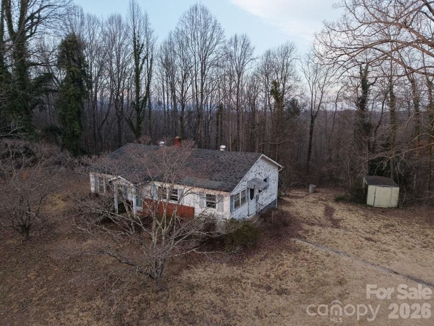 Discover the potential of this charming 3-bedroom, 2-bath home nestled on 4 private, peaceful acres. Featuring beautiful hardwood floors, a spacious back deck perfect for relaxing or entertaining, and a convenient storage building, this property offers both comfort and versatility.

With just a little TLC, this home can truly shine—making it an excellent opportunity for investors, renovators, or buyers looking to create their own private retreat. Enjoy the tranquility of country living while still benefiting from quick and easy access to I-40 for commuting and everyday convenience.

Whether you're searching for your next project, investment property, or a place to call home, 859 Stacy Hill Road is full of possibilities. Schedule your showing today and imagine the potential!