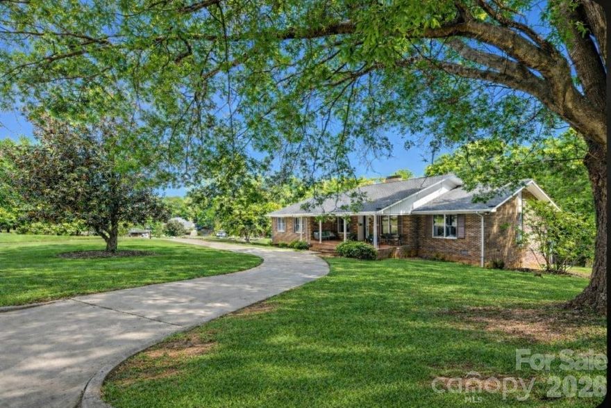 Welcome home to this beautifully updated 4-bedroom, 3 full bath home with a full basement, situated on a spacious 1.22-acre corner lot in the highly sought-after Lakeview Estates neighborhood with no HOA. This versatile property features a desirable in-law suite, private office/den, and multiple living areas, offering flexible space for a variety of needs. The open-concept kitchen and family room create the perfect gathering space, highlighted by new countertops, stainless steel appliances, farmhouse sink, and a center island, while a separate dining room provides a more formal setting for entertaining. Recent upgrades throughout include new flooring, fresh paint, updated lighting, new door hardware, and new outlets, along with major system improvements such as new HVAC units, a new roof (2025), and a crawlspace encapsulation (2024). Outdoor living is just as impressive with a large deck (28x15) overlooking the private backyard, covered patio (29x12) complemented by both a circular front driveway and a separate rear driveway leading to a rear-facing expansive 2-car garage (1154 sq ft) for added convenience and curb appeal. Located near schools, shopping, medical facilities and a short distance to all the charm downtown Monroe has to offer, plus minutes away from Lake Lee boat landing for tranquil boating or fishing. Come see this one today.