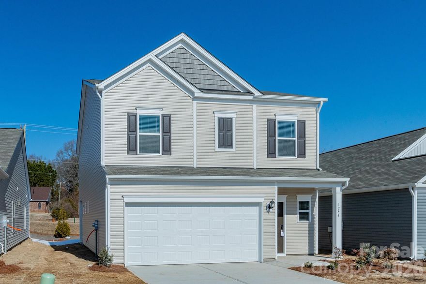 Discover the Buford II at Country Club Village, featuring an open and airy main level that's perfect for entertaining. You are greeted by beautiful staircase as soon as you enter this homesite. The main floor includes a dining area, a spacious family room, and a stylish kitchen with 36” modern cabinets and solid surface countertops. Enjoy meals at the large eat-in kitchen peninsula or step out onto the covered rear patio for a breath of fresh air. The covered patio is perfect for entertaining guests as well. With beautiful crown molding and pendant lights in the kitchen area, the main level truly lights up at any time of the day which pairs well with the beautiful backsplash also in the kitchen. Upstairs, you'll find a spacious owner's suite with a massive walk-in closet perfect for your storage needs. The owner's bath offers a spa-like experience with a large tile shower, a linen closet, and a private water closet. The owner's suite bath also is accompanied with a double vanity and beautiful quartz countertops and brushed nickel interior finishes. The upper level also offers two secondary rooms that use a shared full bath perfect for hosting. The laundry room is also nestled on the upper level for convenience.  You will find a beautiful spacious loft perfect for entertaining, studying, or reading your favorite book.  

This new community is conveniently located just 2 miles from downtown Salisbury, offering easy access to local dining and shopping, as well as quick access to I-85 for a short trip to Charlotte or Greensboro. Call today to set up an appointment to secure The Buford II before it's gone!