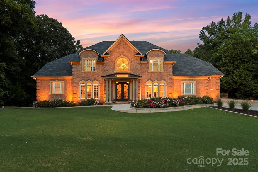 Move right into this nearly 8000 SQFT luxury home with over 630k in recent upgrades/updates! This one-of-a-kind find is in the sought after neighborhood of Beckenham, located in the heart of the newest school district Fort Mill has to offer - and yet close to the newest restaurants and shopping (Target, Costco)! Step through the custom iron double doors where you'll find 4 bedrooms (being used as a 6 bedroom), 7 bathrooms & a ton of UPDATES! 3 interior fireplaces, granite counters, Sub-Zero, Cove, & Wolf appliances. A SCREENED-IN porch provides a comfortable retreat off the kitchen while the exterior features 2 more fireplaces! The home includes a versatile lower level that could serve as an IN-LAW SUITE, teen escape or space for long-term guests with a paved stepless walk-way leading to a separate entrance or use as an ENTERTAINER'S DREAM with a large walk-out finished basement with a full wet bar, a dedicated THEATER ROOM. But WAIT, there's more! Enjoy a luxurious HEATED POOL and SPA, a covered outdoor dining area & patio, a THREE-CAR climate-controlled garage all on a 1-acre private wooded lot with trails and stream at rear.
Quick additional details on upgrades/updates: 17.16kw solar power system with two Tesla Powerwall whole house batteries (they work like a generator when power goes out) – new roof –FIBER OPTIC INTERNET- whole house water filtration system with RO drinking water system and pressure pump with Moen Flow automatic water shut off – two new HVAC systems, the other was rebuilt in 2025 – new pool concrete seal/leak proofing, Pebble Tech liner, tile, pump and heater for pool/spa with winter covers for both and new concrete patio around pool – new 50 gallon water heater and tankless water heater – every bathroom in the house has been remodeled with new fixtures and tile – new primary bedroom closets and two bedroom closets upstairs 2025 – all new high end appliances - and much more! Ask for complete listing of upgrades!