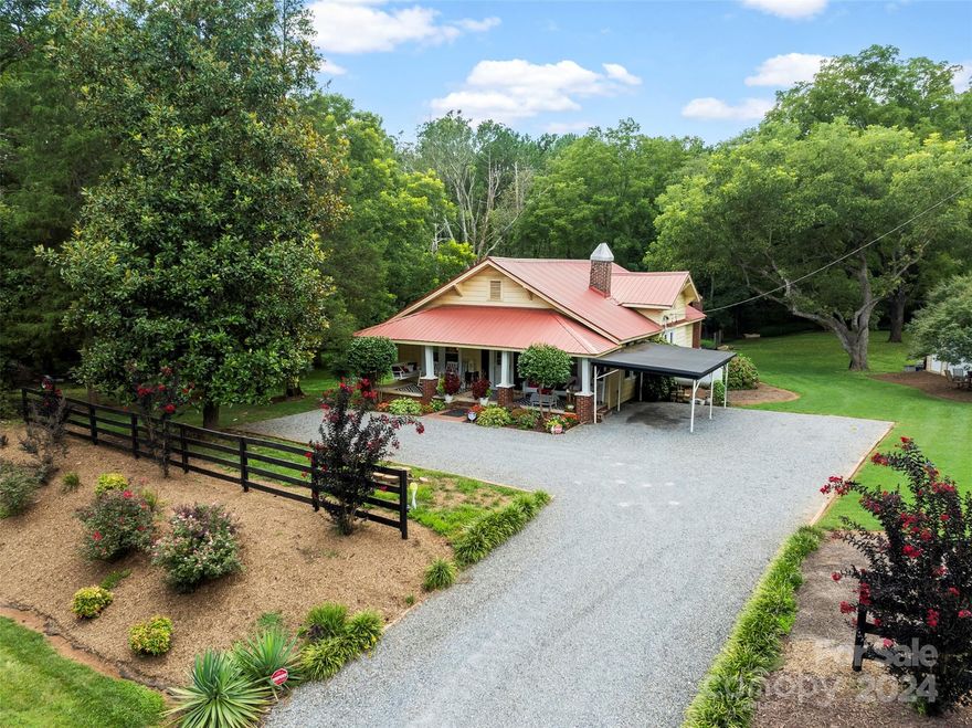 You will love this wonderful 1930 farm house with an updated electrical panel box. Nice private lot 1.26 acres. 2 bedrooms with an office/den that could be used for many things. This home has a lot of character from the 1930s bead board wood walls, coffered ceiling in living room & more. You will love the dining room &  cozy sitting room Nice size rooms & nice layout. Lovely covered front porch for evening reading or just hanging out. Nice 20x20 wired work shop wired for a generator. This lot is so wonderful with mature trees & you may see some wildlife. You will love this one! Minutes from I-85 & Hwy 29/74. Don't miss out on this one.