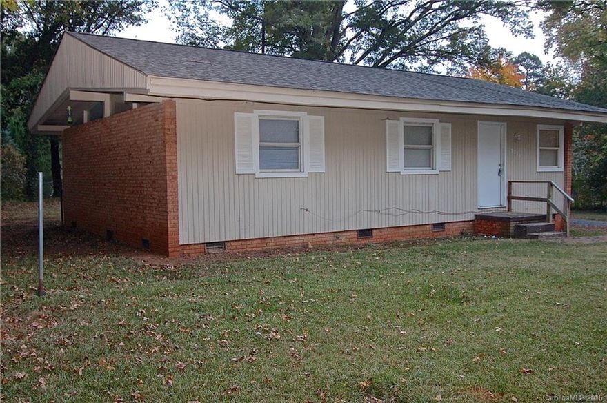 Check out this Mid-Century Ranch with updated kitchen with granite tops! Spacious feel with Vaulted ceilings throughout the living spaces.  Beautiful wood and tile flooring, Generous sized bedrooms in this home great for owner occupant or income property.  Recent roof, Gas Pack.  Private retreat, situated on lot just so, to give great feeling of privacy, and gives a Huge front yard!