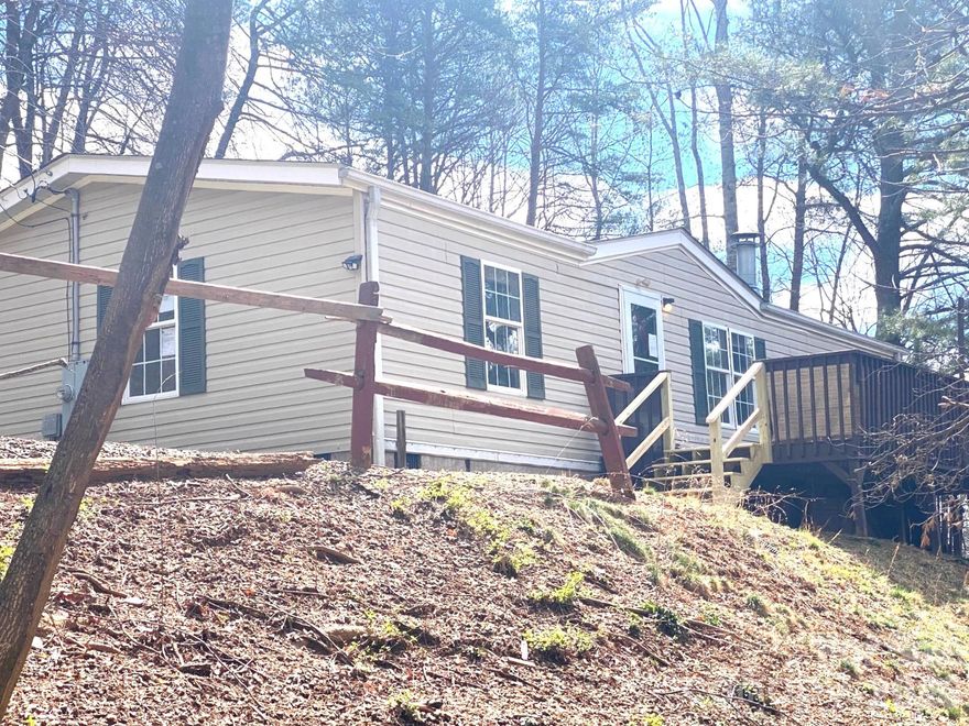 Private and quiet area located on a cul de sac and offers spacious open floor plan, fireplace, large kitchen with abundant storage, split bedroom floor plan, large garden tub in master, Ample parking in driveway, less than 25 minutes from downtown Asheville. Sure to be snapped up quickly, so go see it today.