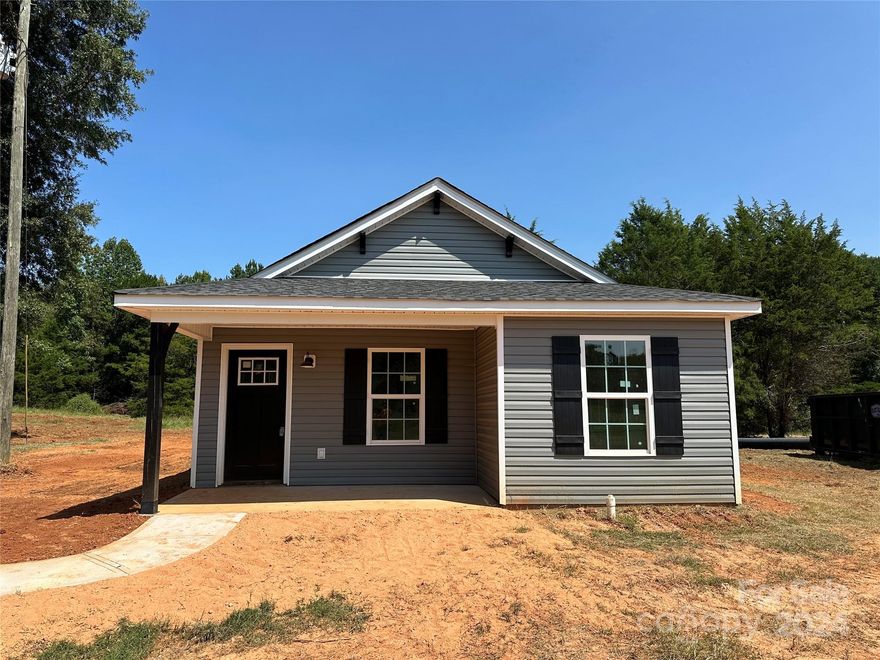***Seller is offering $3,000 towards buyer closing cost or a rate buy down.*** Lake Wylie living can be all yours! This almost finished new construction is located near the heart of Lake Wylie and all there is to do in this lake community! The open floor plan and neutral palette gives any buyer the opportunity to move right in and make it their own! The home is lined with luxury vinyl plank flooring and custom finishes throughout! Enjoy the gorgeous trim accents in the foyer and living room! The kitchen features shaker style cabinetry, granite counter tops, and a trendy tile backsplash! The primary suite is ready for rest and relaxing! It features double closets and a bath with double sinks and walk in shower! 2 more bedrooms, a full bath and laundry room complete the rooms in the one level living custom home! Covered front and side porches let you enjoy all four of our sweet southern seasons! Hurry home to 5856 Oakridge Road!