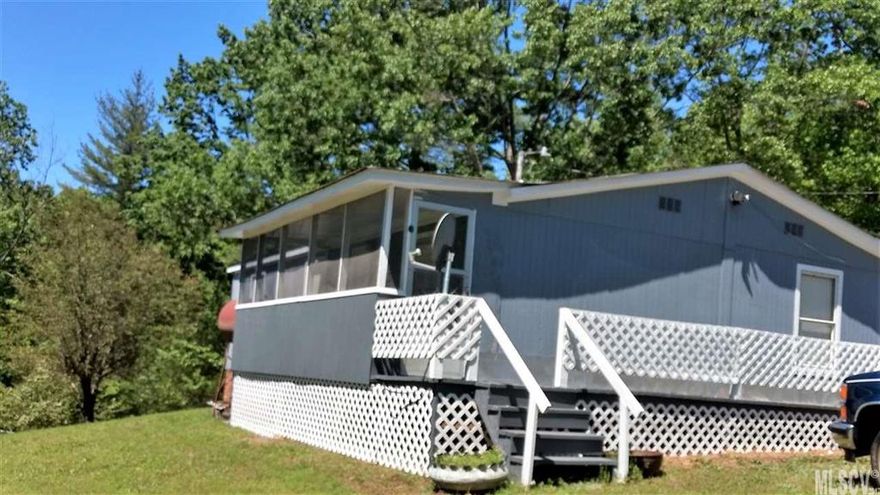 Great starter home or place to retire and put your feet up on the covered porch. Features 3 bedrooms 2 baths on 1.68 acres. Private with room for kids/grandkids, garden, pets. kids friends, and pets friends. outbuilding,