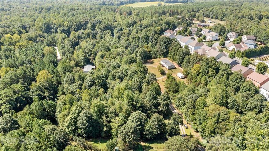 Located minutes from the Ballantyne area. No square footage restrictions or on modular or mobile homes. No HOA. Can be connected to County Water.