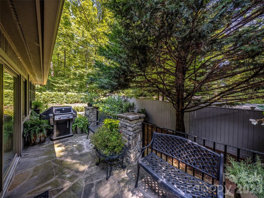 This lakefront condo has been updated throughout and features 2 bedrooms, 2 full baths, one half bath and a bonus room. Offered beautifully furnished, with exceptions.   Step outside to the stone patio, perfect for grilling and entertaining al fresco. The interior dining area is complete with a wet bar and opens to the beautifully renovated kitchen. Settle in by the fireplace after the sun goes down and enjoy the porch and gorgeous lake views.  Retire to the primary en-suite above it all with spaces thoughtfully designed for efficiency and organization. Toxaway Shores has all the coveted amenities - private pool, private tennis/pickleball court, a wrap-around dock with your own boat slip, a community clubhouse and a lush green lawn to enjoy all the summer activities. Enjoy maintenance-free living in this condo on the lake.