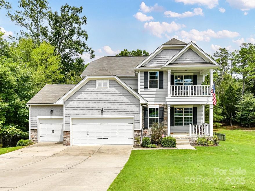 It's not often you can find a two-story home with a finished basement, a 3-car garage and seasonal lake views. This immaculate home features 5 bedrooms & 4 full bathrooms with a convenient guest bedroom and bath on the main floor. The open concept living area flows into a stunning kitchen with granite counters, stainless steel appliances and backsplash. The finished basement offers a versatile recreation room, ideal for a home theater, game room or second quarters. Check out the large bedroom with built in desk and murphy bed. The beautiful primary suite is located upstairs with two additional bedrooms and a loft space. Get your smore's ready and a light up that firepit for that weekend outdoor movie night that's already set up in the expansive fenced in yard with a shed. This great home is located in the award-winning Clover school district. There are so many extras that you must come and see for yourself. This great community offers a neighborhood pool and boat storage.