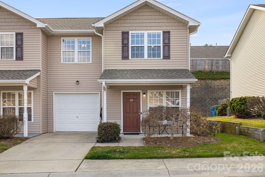 Welcome home to this beautifully maintained end-unit townhome in desirable Fletcher. Offering 3 bedrooms and 2.5 baths, this move-in ready home combines comfort, thoughtful updates, and a convenient location. The inviting living room features a cozy fireplace and flows easily into the dining area, creating a warm and functional space for everyday living. Just off the dining area, step outside to a private fenced backyard with a charming patio, perfect for outdoor dining, entertaining guests, or relaxing in the fresh air. The kitchen is well-appointed with recently updated appliances, providing both style and practicality. Upstairs, the spacious primary suite includes an en-suite bathroom and generous closet space. There are two additional bedrooms that offer flexibility for family, guests, or a home office that share a hall bathroom.  The owner of this well-cared-for home also replaced the A/C in 2021 and the furnace in 2025. Ideally located between Hendersonville and Asheville, and just minutes from the airport and South Asheville amenities, this property offers an excellent combination of comfort, convenience, and low-maintenance living.