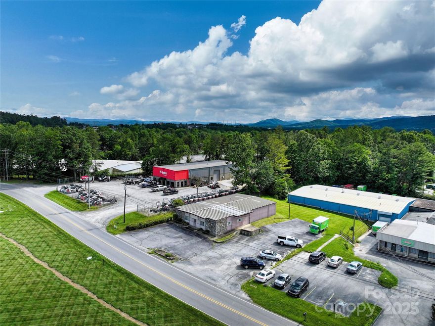 Discover this strategically located 4,080 SF commercial building, just one minute from Airport Road and offering central access to the Asheville metro. Equipped for a variety of uses, the property features a rare loading dock, 16 parking spaces, and 3-phase power. The facility includes a 1,500 SF office area with three private offices and a bullpen, all situated on a 0.56-acre lot. A key advantage is the excess land, providing rare and valuable potential for future expansion, outdoor storage, or customized development in a thriving market.

Building conveyed vacant
Contact Listing broker for more information & access