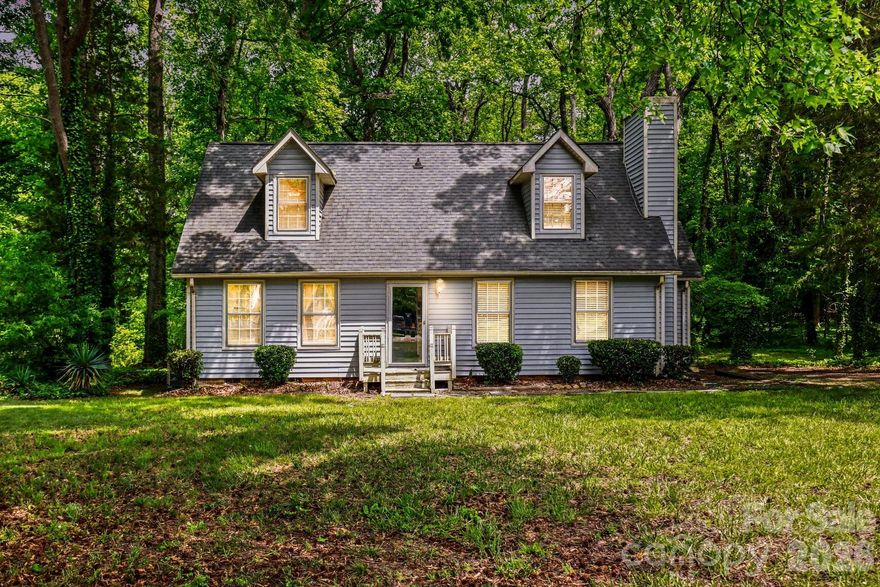Charming 1.5-story Cape Cod home nestled on a beautiful, tree-filled lot just under an acre. This 4-bedroom, 2-bath home offers 1,547 sq ft of comfortable living with a functional and desirable layout. The primary bedroom is conveniently located on the main level, along with an additional first-floor bedroom—perfect for guests or a home office. Two more bedrooms are located upstairs, providing privacy and flexibility.
Enjoy the peaceful setting while still being close to everything you need. The property is just minutes from Walmart, with a brand-new Target currently under construction right outside the neighborhood. You’ll also find a variety of great restaurants nearby and easy access to Interstate 77, only about 5 minutes away—making commuting a breeze.
A rare combination of space, convenience, and charm—this home is ready to welcome its next owner.